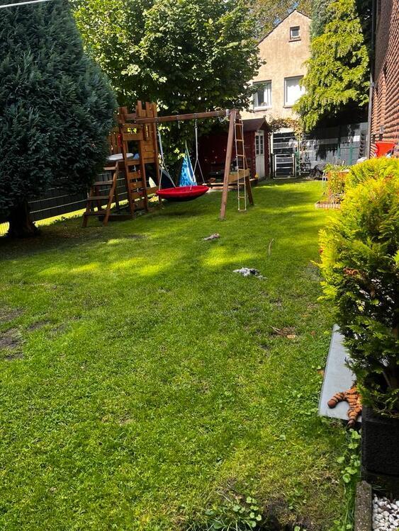 Charmante Eigentumswohnung mit Terrasse und Garten
