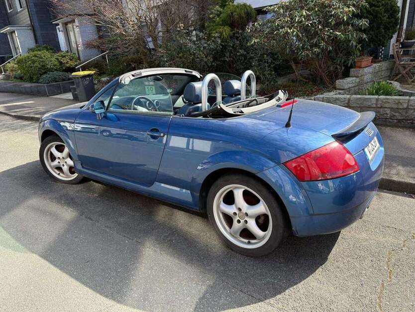 TT