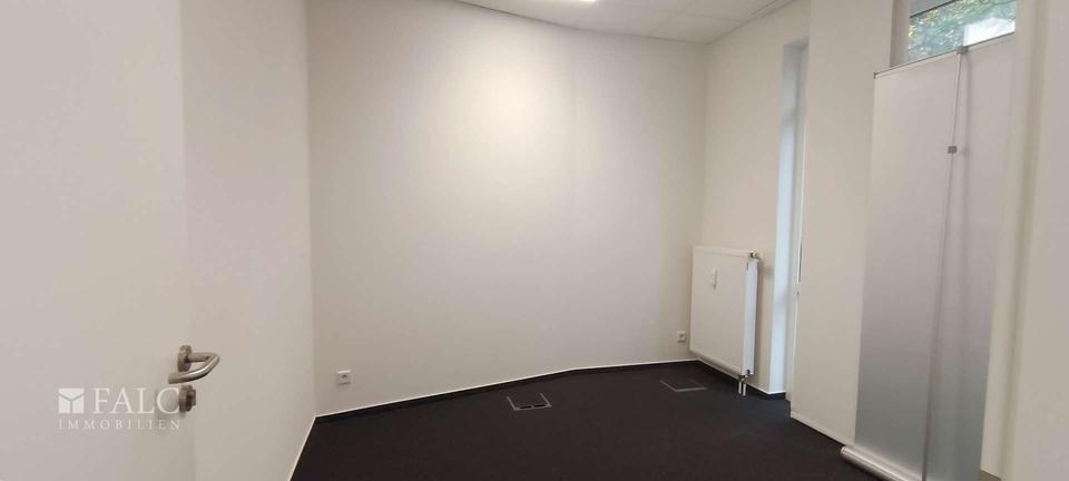 Raum für Visionen – stilvolle Gewerbeimmobilie mit Glasfront und Charakter zimmer