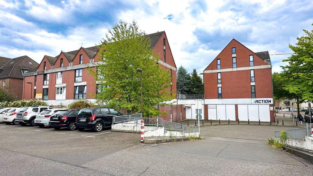 Ertragstarkes Wohn-Geschäftshaus mit solidem Ankermieter, Wohneinheiten und Tiefgarage zimmer