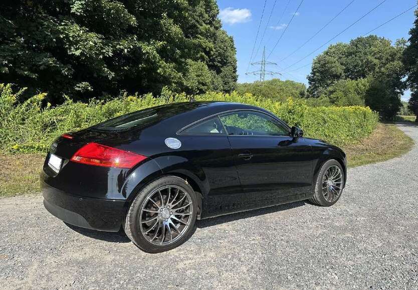 TT
