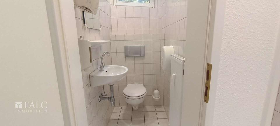 Raum für Visionen – stilvolle Gewerbeimmobilie mit Glasfront und Charakter zimmer