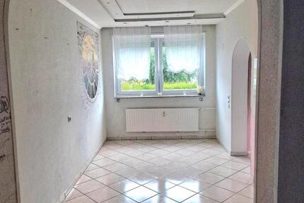 Erdgeschosswohnung mit Garten und Grage 3 zimmer