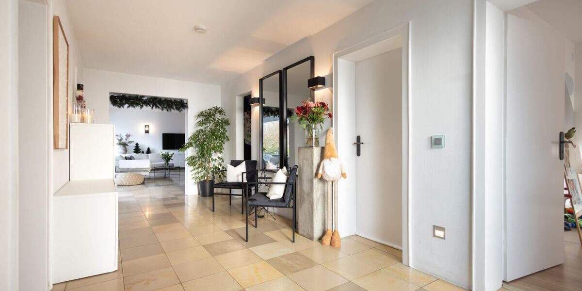 Wohnen auf einer Ebene - exklusives Einfamilienhaus mit beeindruckendem Außenareal in ruhiger Lage 5 zimmer