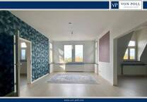 Modernisierte Wohnung mit Einbauküche und Stellplatz in zentraler Lage