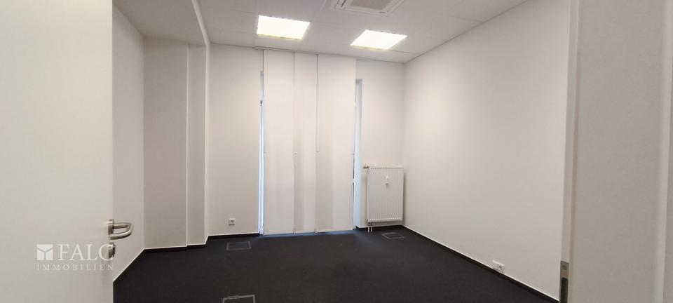 Raum für Visionen – stilvolle Gewerbeimmobilie mit Glasfront und Charakter zimmer