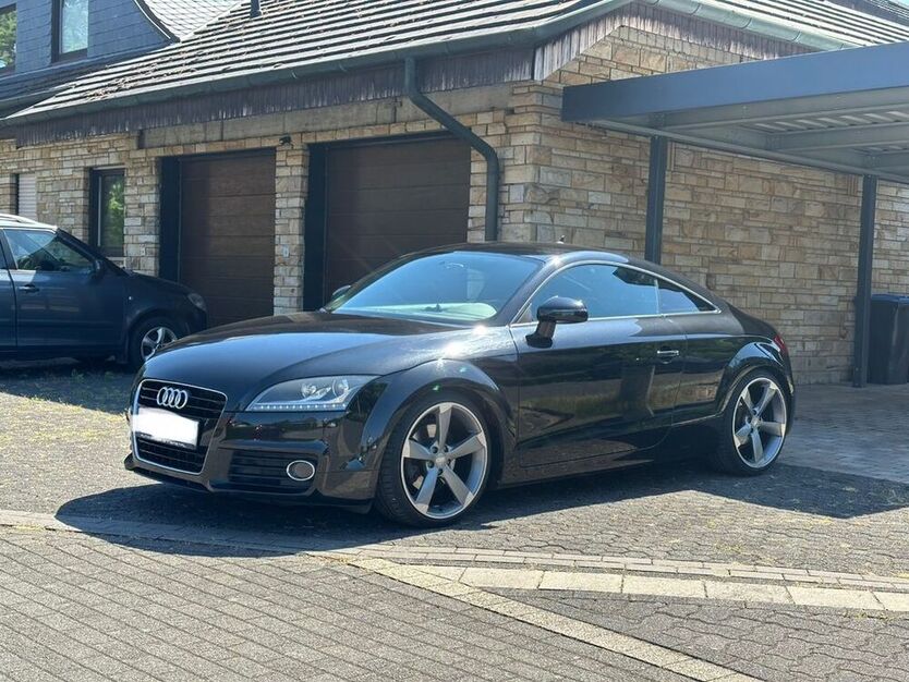 TT