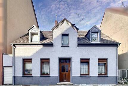 Großzügiges Einfamilienhaus mit 8 Zimmern, Garten und historischem Charme 8 zimmer